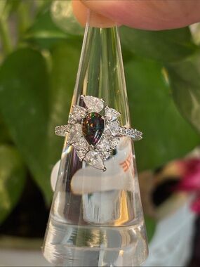Pear-Shaped Black Opal Halo Ring with White Zircon Accents